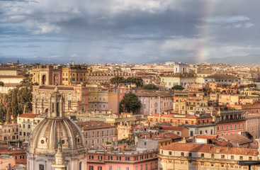 Fototapeta na wymiar Panorama of Rome from Altar of Fatherland at evening rainy day in Rome, Italy.