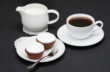 Cupcakes With Cocoa And White Cream. Coffee And Milk