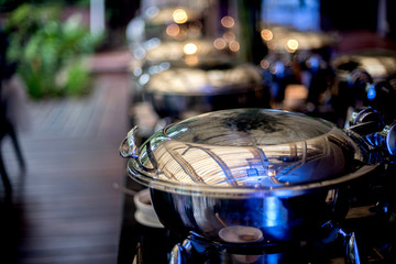 Buffet Table with Row of Food Service Steam Pans