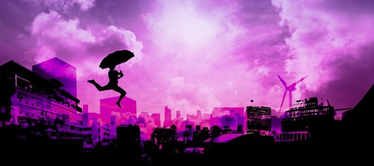 Composite image of woman jumping with umbrella