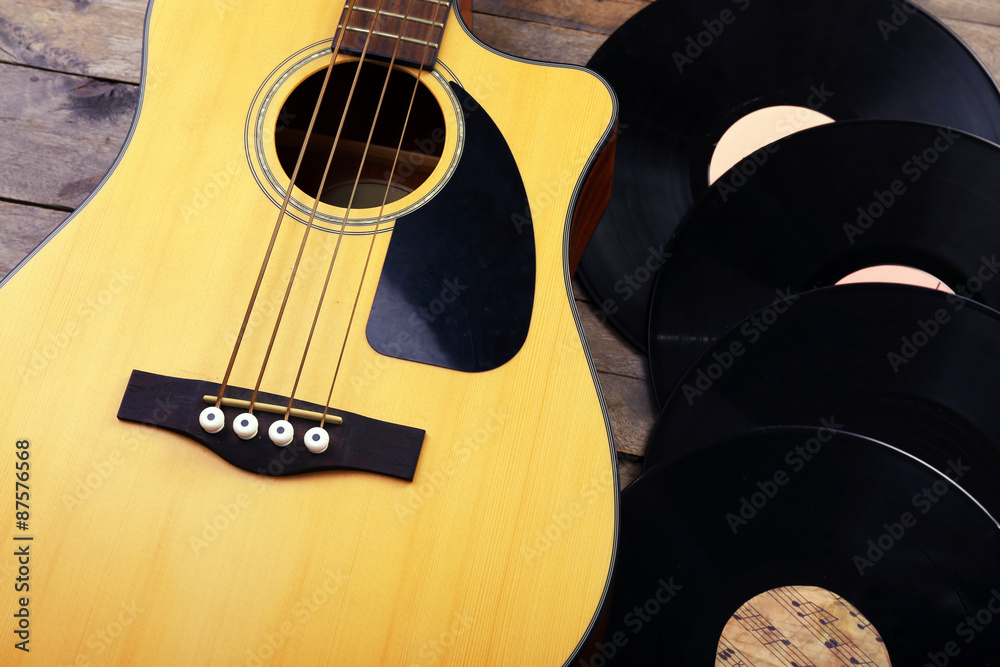 Wall mural Guitar and vinyl records close up