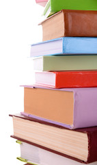Heap of books on light background