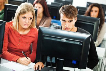 Students learning in computer lab