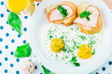 Breakfast. Fried eggs and sandwiches