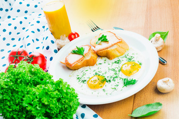 Breakfast. Fried eggs and sandwiches