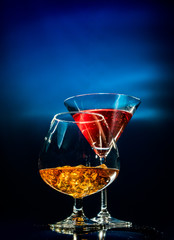 Two glasses with alcohol