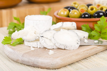 Goat's Cheese & Olives - Full fat mould ripened soft goat's milk cheese served with mixed olives.
