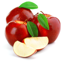 Red apples with leaves and slices isolated on white