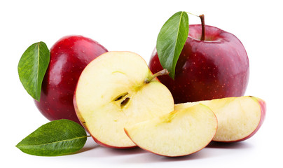 Red apples with leaves and slices isolated on white