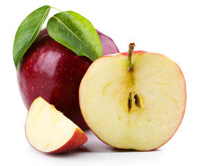 Red apples with leaves and slices isolated on white