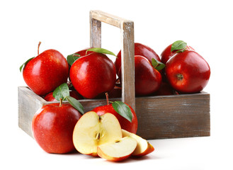 Red apples in wooden crate isolate on white
