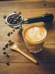 cup of coffee latte on the wood texture