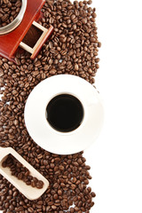 Cup of coffee with saucer and mill background