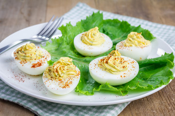 Spicy deviled eggs sprinkled with paprika