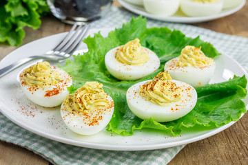 Spicy deviled eggs sprinkled with paprika
