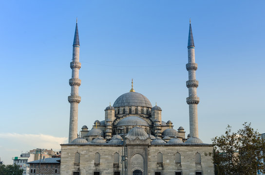 The New Mosque (Yeni) at sunset, twilight, Istanbul, Turkey