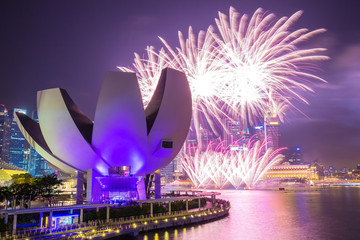 Singapore Skyline with fireworks at twilight