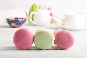 Macaroons on the wooden table