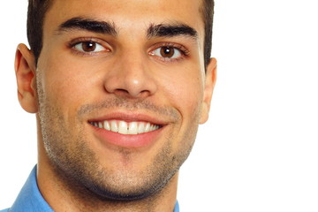 Obraz premium Smile from young man close-up on white background