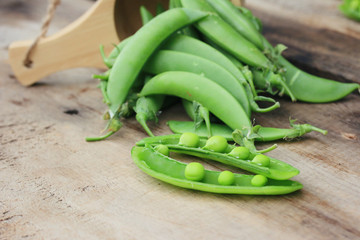 Fresh green soybeans on a wooden vintage