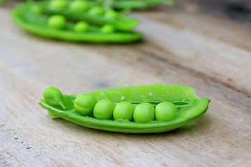 Fresh green soybeans on a wooden vintage