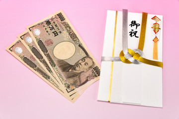 祝儀袋と一万円紙幣