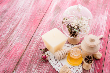 spa treatment -  star anise, honey, salt, arranged with soap bar