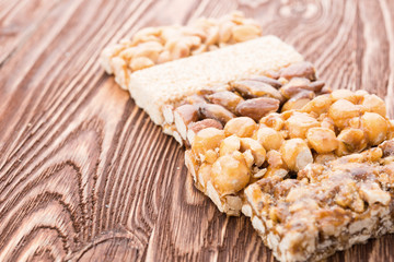 Peanut brittle sweet hard on wooden table