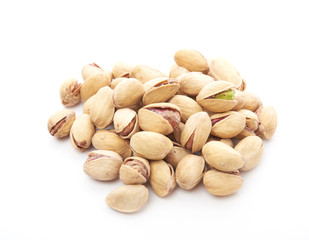 Heap of pistachios nuts isolated on the white