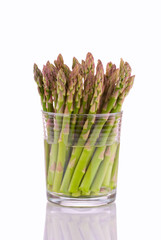Fresh asparagus in a glass