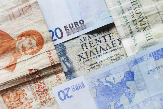 Greek drachma and euro paper money