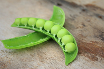 Fresh green soybeans on a wooden vintage