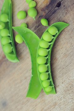 Fresh green soybeans on a wooden vintage