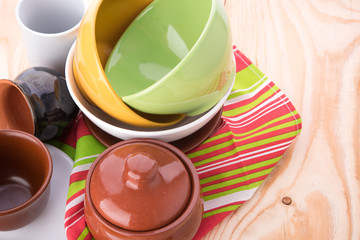 plates and cups on wooden table