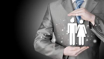 businessman protecting family Insurance concept