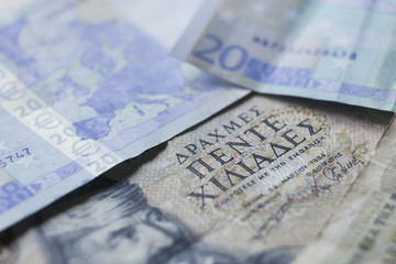 Naklejka premium Greek drachma and euro paper money