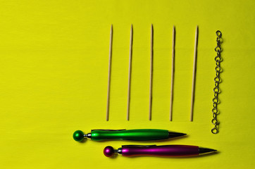Sticks and ballpoint pens 
