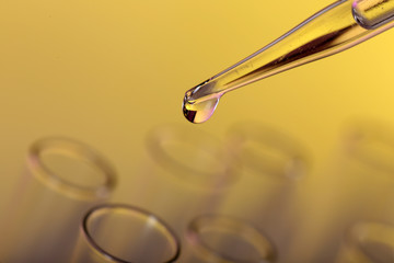 Test tubes on color background