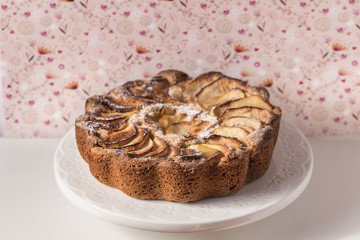 Homemade apple pie over a vintage background