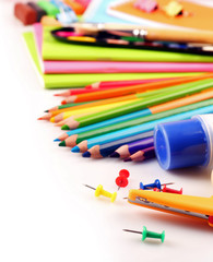 Colorful school stationery isolated on white
