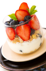 Fresh Yogurt with strawberries and blueberries.