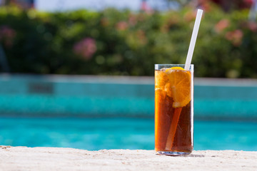 Glass of Cuba Libre cocktail
