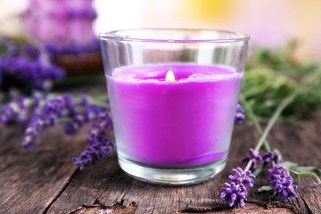 Plakat Candles with lavender flowers on table close up