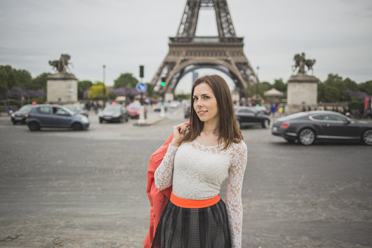 Tourist young woman at eifel tower Paris