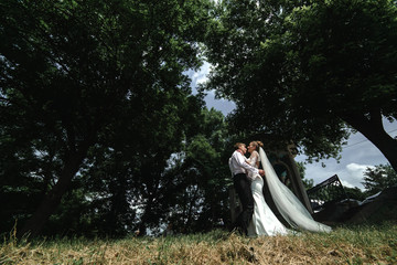 Bride and groom in the forest