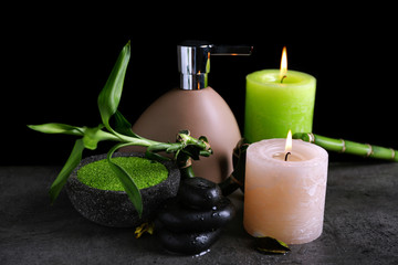 Beautiful composition of spa treatment on dark background