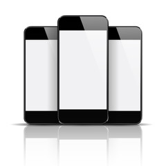 Three mobile phones on reflective white background.