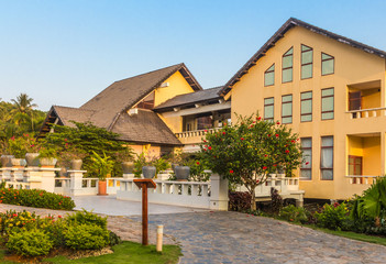 Fototapeta na wymiar Vietnamese hotel building with garden