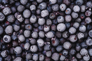 The texture of frozen berries, blueberries