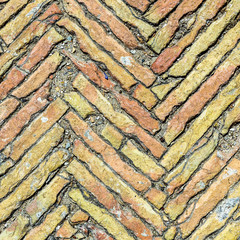 Broken brown brick floor